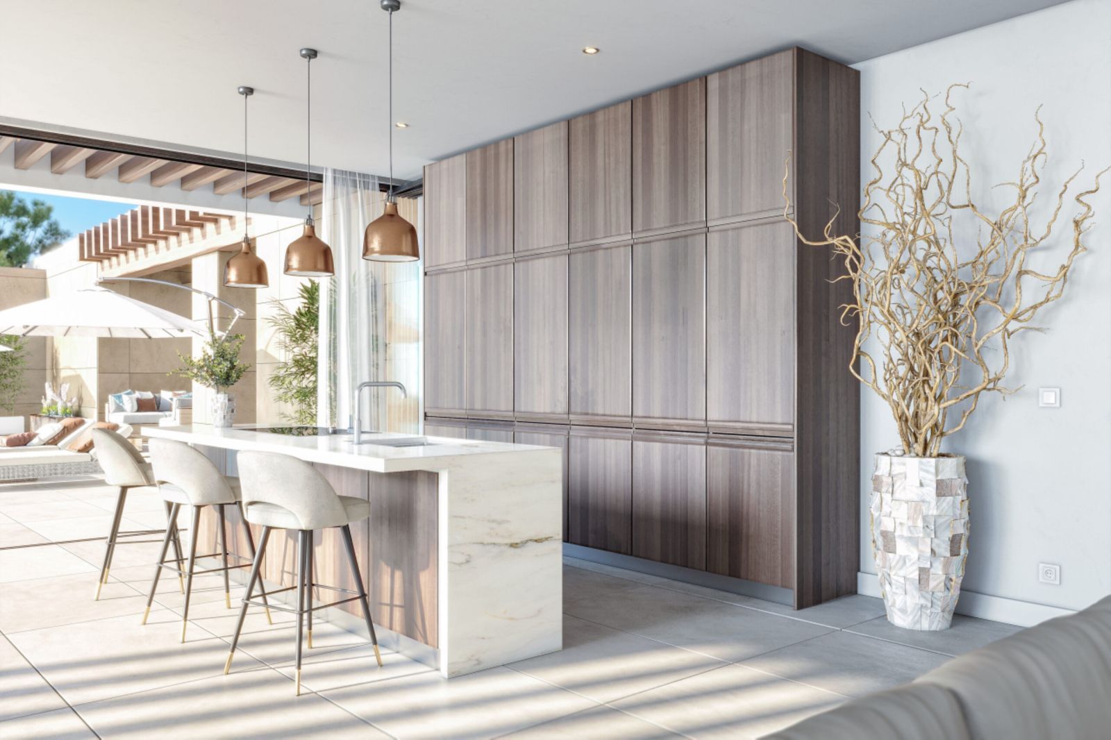 Modern kitchen with marble island, wooden cabinets, and outdoor patio view.